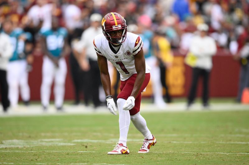 Washington Commanders wide receiver Jahan Dotson (1) in action during the first half of a NFL football game against the Jacksonville Jaguars, Sunday, Sept. 11, 2022, in Landover, Md. (AP Photo/Nick Wass)