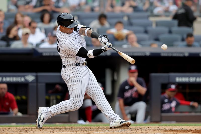 Aug 24, 2023; Bronx, New York, USA; New York Yankees second baseman Gleyber Torres (25) hits a two run home run against the Washington Nationals during the third inning at Yankee Stadium. Mandatory Credit: Brad Penner-USA TODAY Sports