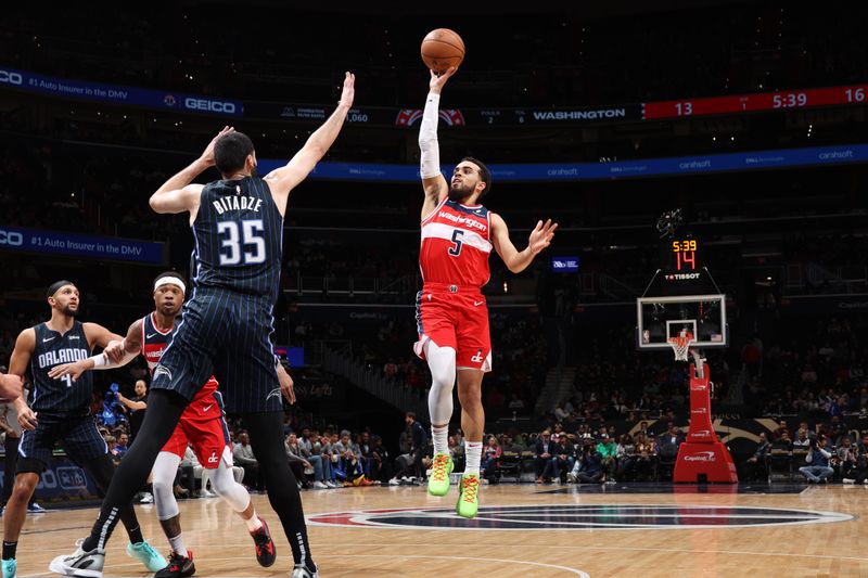 WASHINGTON, DC -? MARCH 6:  Tyus Jones #5 of the Washington Wizards goes to the basket during the game on March 6, 2024 at Capital One Arena in Washington, DC. NOTE TO USER: User expressly acknowledges and agrees that, by downloading and or using this Photograph, user is consenting to the terms and conditions of the Getty Images License Agreement. Mandatory Copyright Notice: Copyright 2024 NBAE (Photo by Stephen Gosling/NBAE via Getty Images)