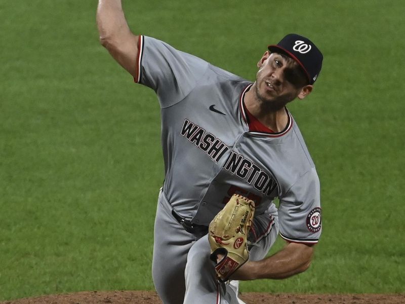 Aug 14, 2024; Baltimore, Maryland, USA;  Washington Nationals relief pitcher Robert Garcia (61) pitches the seventh inning 
against the Baltimore Orioles at Oriole Park at Camden Yards. Mandatory Credit: Tommy Gilligan-USA TODAY Sports