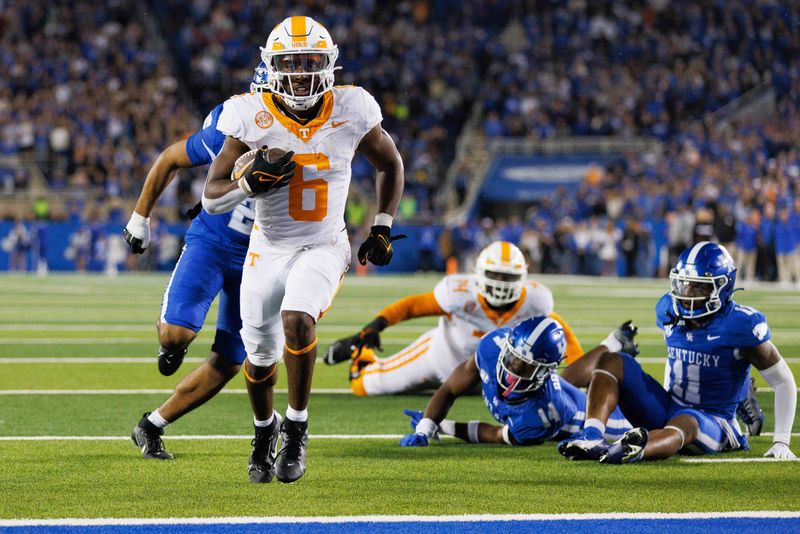 Oct 28, 2023; Lexington, Kentucky, USA; Tennessee Volunteers running back Dylan Sampson (6) runs the ball into the end zone for a touchdown during the fourth quarter against the Kentucky Wildcats at Kroger Field. Mandatory Credit: Jordan Prather-USA TODAY Sports