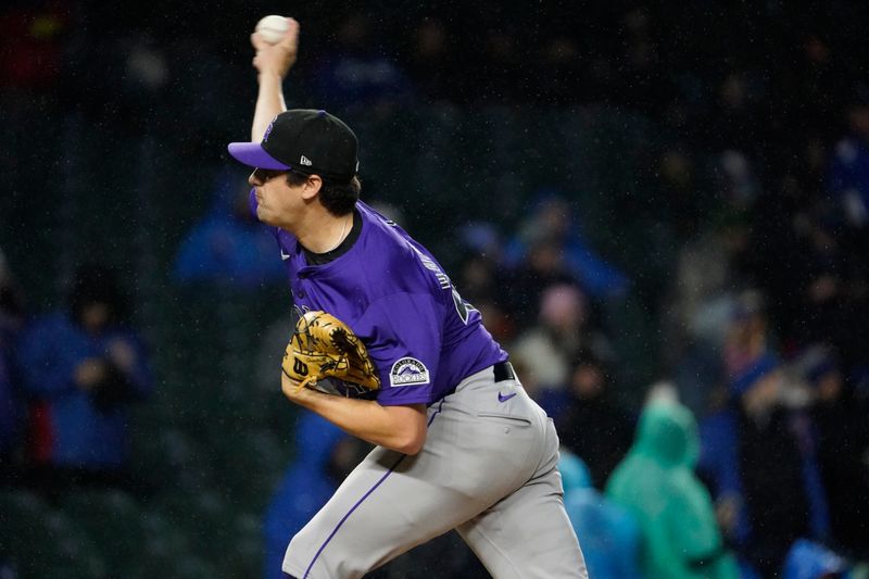 Apr 3, 2024; Chicago, Illinois, USA; Colorado Rockies starting pitcher Cal Quantrill (47) throws the ball against the Chicago Cubs during the first inning at Wrigley Field. Mandatory Credit: David Banks-USA TODAY Sports