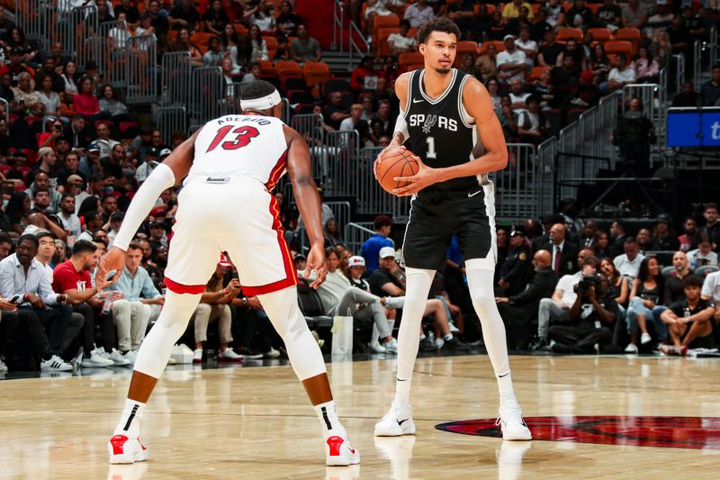 MIAMI, FL - OCTOBER 15: Victor Wembanyama #1 of the San Antonio Spurs handles the ball during the game on October 15, 2024 at Kaseya Center in Miami, Florida. NOTE TO USER: User expressly acknowledges and agrees that, by downloading and or using this Photograph, user is consenting to the terms and conditions of the Getty Images License Agreement. Mandatory Copyright Notice: Copyright 2024 NBAE (Photo by Issac Baldizon/NBAE via Getty Images)