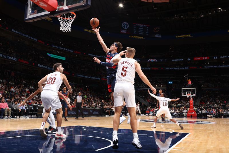 WASHINGTON, DC -? OCTOBER 26: Corey Kispert #24 of the Washington Wizards drives to the basket during the game against the Cleveland Cavaliers on October 26, 2024 at Capital One Arena in Washington, DC. NOTE TO USER: User expressly acknowledges and agrees that, by downloading and or using this Photograph, user is consenting to the terms and conditions of the Getty Images License Agreement. Mandatory Copyright Notice: Copyright 2024 NBAE (Photo by Stephen Gosling/NBAE via Getty Images)