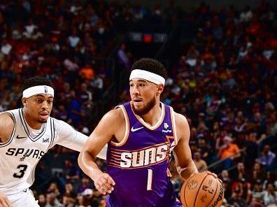 PHOENIX, AZ - NOVEMBER 2: Devin Booker #1 of the Phoenix Suns dribbles the ball during the game against the San Antonio Spurs on November 2, 2023 at Footprint Center in Phoenix, Arizona. NOTE TO USER: User expressly acknowledges and agrees that, by downloading and or using this photograph, user is consenting to the terms and conditions of the Getty Images License Agreement. Mandatory Copyright Notice: Copyright 2023 NBAE (Photo by Barry Gossage/NBAE via Getty Images)