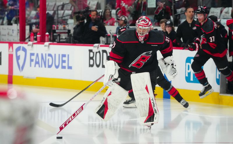 May 16, 2024; Raleigh, North Carolina, USA; Carolina Hurricanes goaltender Frederik Andersen (31) skates out onto the ice for the warmups before the game against the New York Rangers in game six of the second round of the 2024 Stanley Cup Playoffs at PNC Arena. Mandatory Credit: James Guillory-USA TODAY Sports