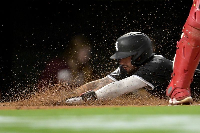 Sep 16, 2024; Anaheim, California, USA;  Chicago White Sox shortstop baseman Jacob Amaya (18) slides home for a run in the second inning against the Los Angeles Angels at Angel Stadium. Mandatory Credit: Jayne Kamin-Oncea-Imagn Images