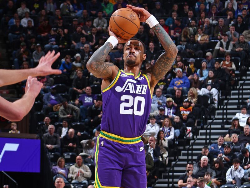 SALT LAKE CITY, UT - JANUARY 10: John Collins #20 of the Utah Jazz three point basket during the game against the Denver Nuggets on January 10, 2024 at Delta Center in Salt Lake City, Utah. NOTE TO USER: User expressly acknowledges and agrees that, by downloading and or using this Photograph, User is consenting to the terms and conditions of the Getty Images License Agreement. Mandatory Copyright Notice: Copyright 2024 NBAE (Photo by Melissa Majchrzak/NBAE via Getty Images)