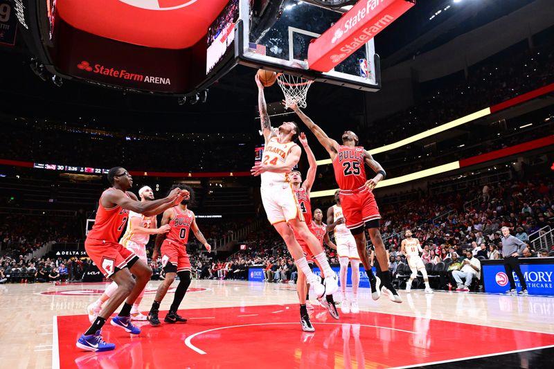 ATLANTA, GA - NOVEMBER 9: Garrison Mathews #24 of the Atlanta Hawks drives to the basket during the game against the Chicago Bulls on November 9, 2024 at State Farm Arena in Atlanta, Georgia.  NOTE TO USER: User expressly acknowledges and agrees that, by downloading and/or using this Photograph, user is consenting to the terms and conditions of the Getty Images License Agreement. Mandatory Copyright Notice: Copyright 2024 NBAE (Photo by Adam Hagy/NBAE via Getty Images)