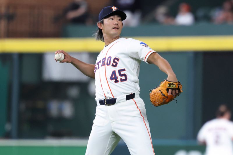 Mar 29, 2026; Houston, Texas, USA; Houston Astros starting pitcher Tatsuya Imai (45) warms up before the game against the Los Angeles Angels at Daikin Park. Mandatory Credit: Troy Taormina-Imagn Images