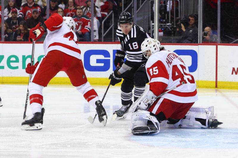 Dec 23, 2023; Newark, New Jersey, USA; Detroit Red Wings goaltender Michael Hutchinson (45) makes a save against the New Jersey Devils during the second period at Prudential Center. Mandatory Credit: Ed Mulholland-USA TODAY Sports