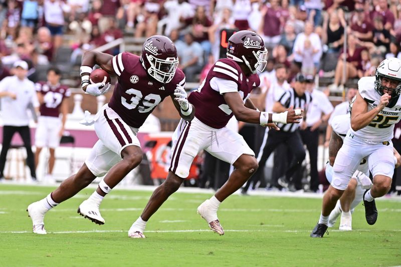 Sep 2, 2023; Starkville, Mississippi, USA; Mississippi State Bulldogs linebacker Avery Sledge (39) runs the ball after recovering a blocked punt against the Southeastern Louisiana Lions on a play that would result in a touchdown during the fourth quarter at Davis Wade Stadium at Scott Field. Mandatory Credit: Matt Bush-USA TODAY Sports