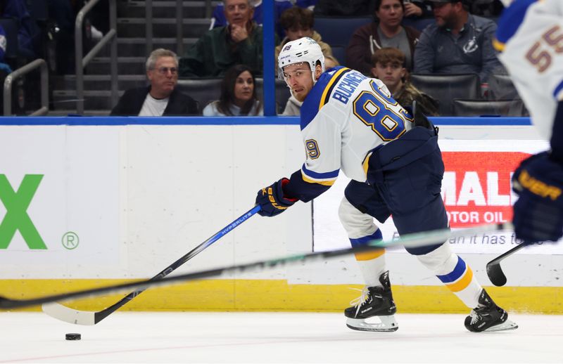 Dec 19, 2023; Tampa, Florida, USA; St. Louis Blues left wing Pavel Buchnevich (89) skates with the puck against the Tampa Bay Lightning during the first period at Amalie Arena. Mandatory Credit: Kim Klement Neitzel-USA TODAY Sports