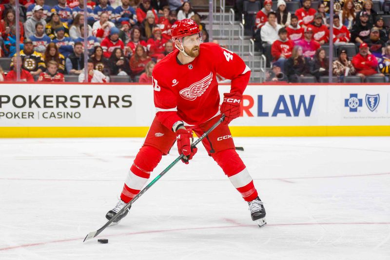 Nov 23, 2024; Detroit, Michigan, USA; Detroit Red Wings defenseman Jeff Petry (46) handles the puck during the first period of the game against the Boston Bruins at Little Caesars Arena. Mandatory Credit: Brian Bradshaw Sevald-Imagn Images