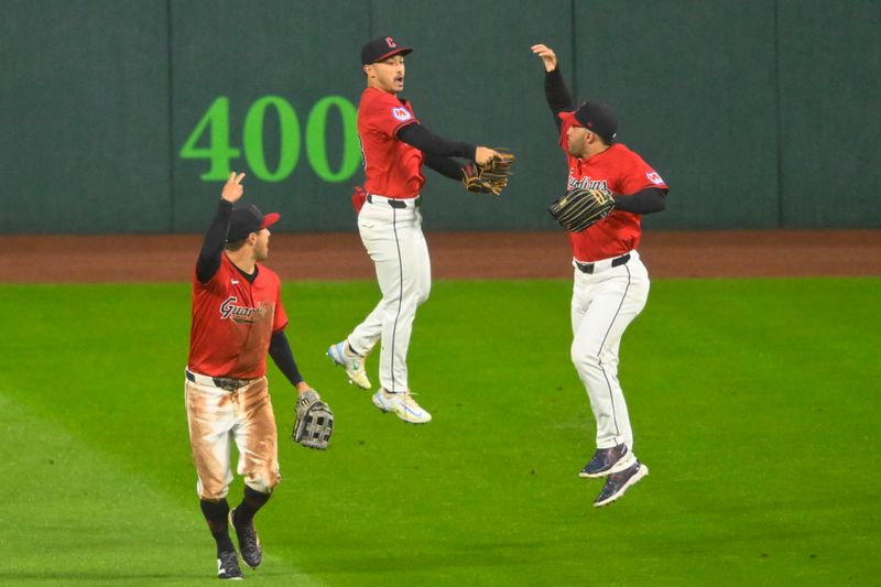 Apr 23, 2024; Cleveland, Ohio, USA; The Cleveland Guardians celebrate a win over the Boston Red Sox at Progressive Field. Mandatory Credit: David Richard-USA TODAY Sports