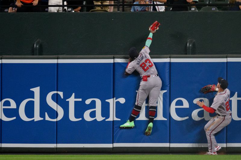 Jun 12, 2024; Baltimore, Maryland, USA; Atlanta Braves outfielder Michael Harris II (23) misses a catch during the eighth inning against the Baltimore Orioles at Oriole Park at Camden Yards. Mandatory Credit: Reggie Hildred-USA TODAY Sports