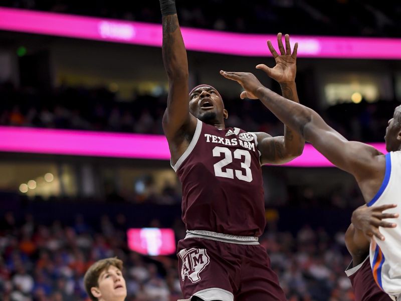 Mar 16, 2024; Nashville, TN, USA;  Texas A&M Aggies guard Tyrece Radford (23) lays the ball in against the Florida Gators during the first half at Bridgestone Arena. Mandatory Credit: Steve Roberts-USA TODAY Sports