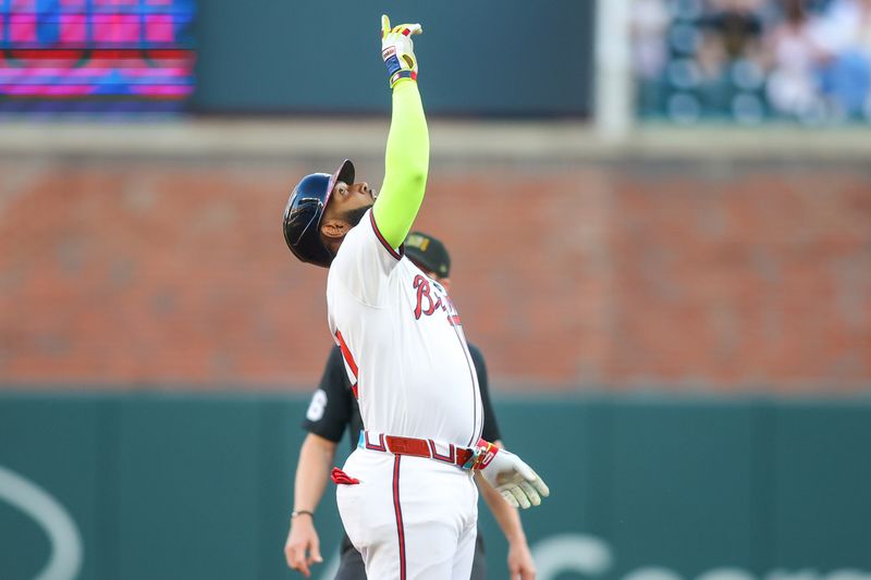 May 19, 2024; Atlanta, Georgia, USA; Atlanta Braves designated hitter Marcell Ozuna (20) reacts after a double against the San Diego Padres in the first inning at Truist Park. Mandatory Credit: Brett Davis-USA TODAY Sports