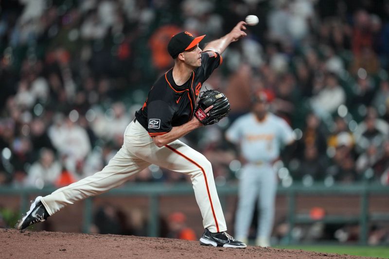 Apr 27, 2024; San Francisco, California, USA; San Francisco Giants pitcher Taylor Rogers (33) throws a pitch against the Pittsburgh Pirates during the tenth inning at Oracle Park. Mandatory Credit: Darren Yamashita-USA TODAY Sports