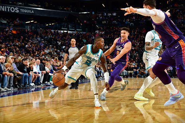 PHOENIX, AZ - DECEMBER 29: Terry Rozier #3 of the Charlotte Hornets drives to the basket during the game against the Phoenix Suns on December 29, 2023 at Footprint Center in Phoenix, Arizona. NOTE TO USER: User expressly acknowledges and agrees that, by downloading and or using this photograph, user is consenting to the terms and conditions of the Getty Images License Agreement. Mandatory Copyright Notice: Copyright 2023 NBAE (Photo by Kate Frese/NBAE via Getty Images)