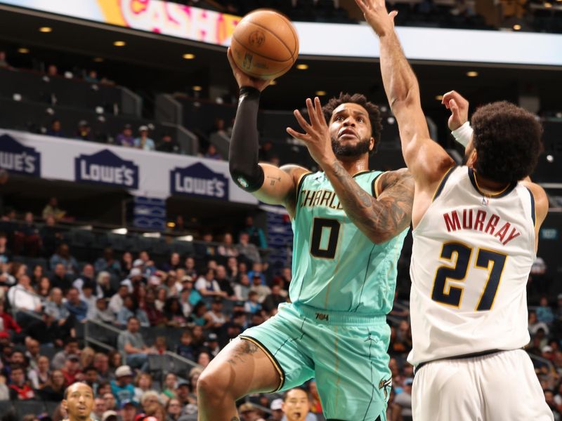 CHARLOTTE, NC - FEBRUARY 1: Miles Bridges #0 of the Charlotte Hornets drives to the basket during the game against the Denver Nuggets on February 1, 2025 at Spectrum Center in Charlotte, North Carolina. NOTE TO USER: User expressly acknowledges and agrees that, by downloading and or using this photograph, User is consenting to the terms and conditions of the Getty Images License Agreement. Mandatory Copyright Notice: Copyright 2025 NBAE (Photo by Kent Smith/NBAE via Getty Images)