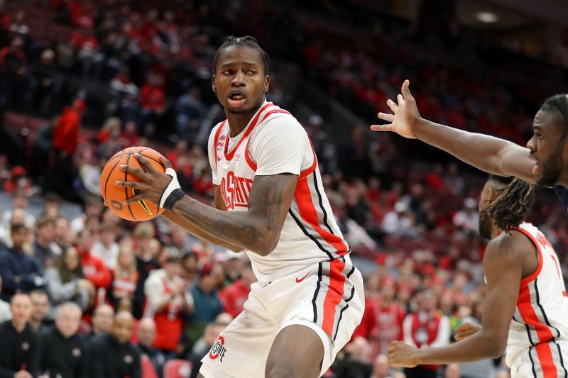 Jan 20, 2024; Columbus, Ohio, USA;  Ohio State Buckeyes center Felix Okpara (34) rebounds the ball during the first half against the Penn State Nittany Lions at Value City Arena. Mandatory Credit: Joseph Maiorana-USA TODAY Sports