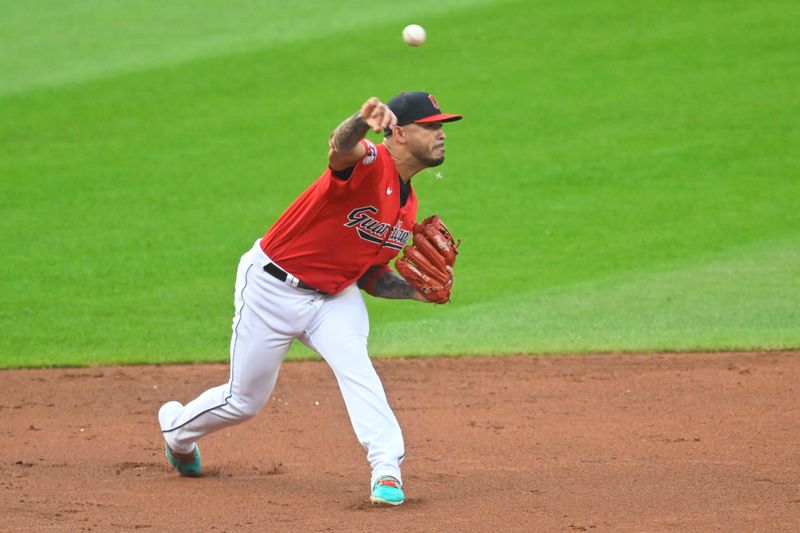 Aug 19, 2023; Cleveland, Ohio, USA; Cleveland Guardians shortstop Gabriel Arias (13) throws to first base in the second inning against the Detroit Tigers at Progressive Field. Mandatory Credit: David Richard-USA TODAY Sports