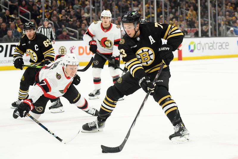 Apr 16, 2024; Boston, Massachusetts, USA;  Boston Bruins defenseman Charlie McAvoy (73) controls the puck while Ottawa Senators left wing Brady Tkachuk (7) defends during the third period at TD Garden. Mandatory Credit: Bob DeChiara-USA TODAY Sports