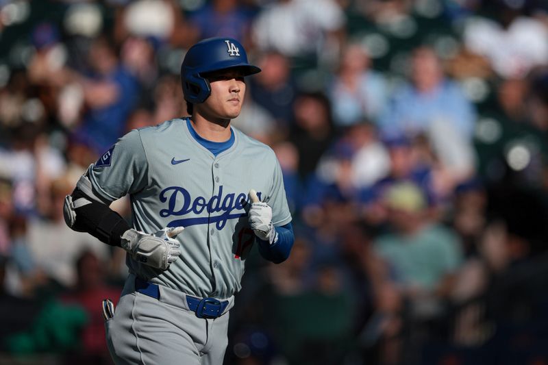 May 28, 2024; New York, NY, USA;  Los Angeles Dodgers designated hitter Shohei Ohtani (17) runs off the field after an out during the sixth inning against the New York Mets at Citi Field. Mandatory Credit: Vincent Carchietta-USA TODAY Sports