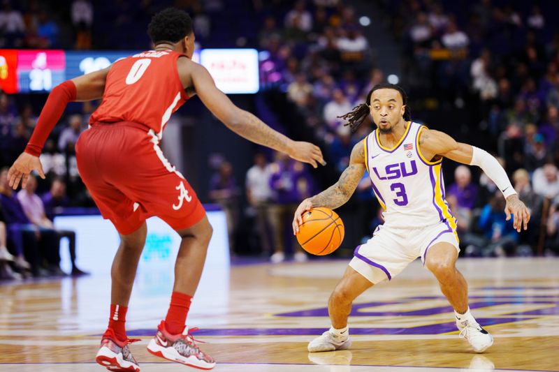 Feb 4, 2023; Baton Rouge, Louisiana, USA; LSU Tigers guard Justice Hill (3) drives to the basket against Alabama Crimson Tide guard Jaden Bradley (0) during the first half at Pete Maravich Assembly Center. Mandatory Credit: Andrew Wevers-USA TODAY Sports