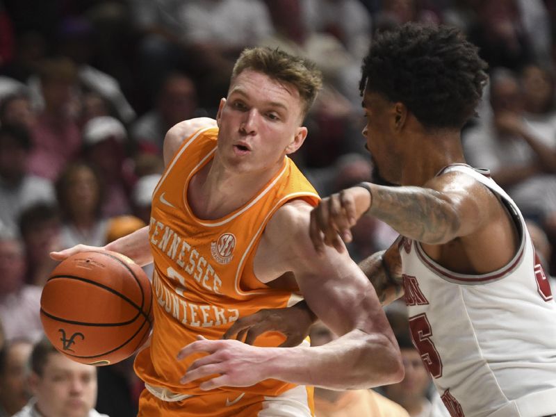 Mar 2, 2024; Tuscaloosa, Alabama, USA; Tennessee guard Dalton Knecht (3) controls the ball as Alabama guard Aaron Estrada defends at Coleman Coliseum. Mandatory Credit: Gary Cosby Jr.-USA TODAY Sports