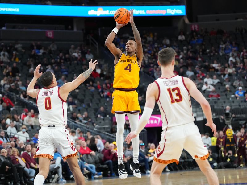 Mar 9, 2023; Las Vegas, NV, USA; Arizona State Sun Devils guard Desmond Cambridge Jr. (4) shoots against USC Trojans forward Kobe Johnson (0) during the first half at T-Mobile Arena. Mandatory Credit: Stephen R. Sylvanie-USA TODAY Sports