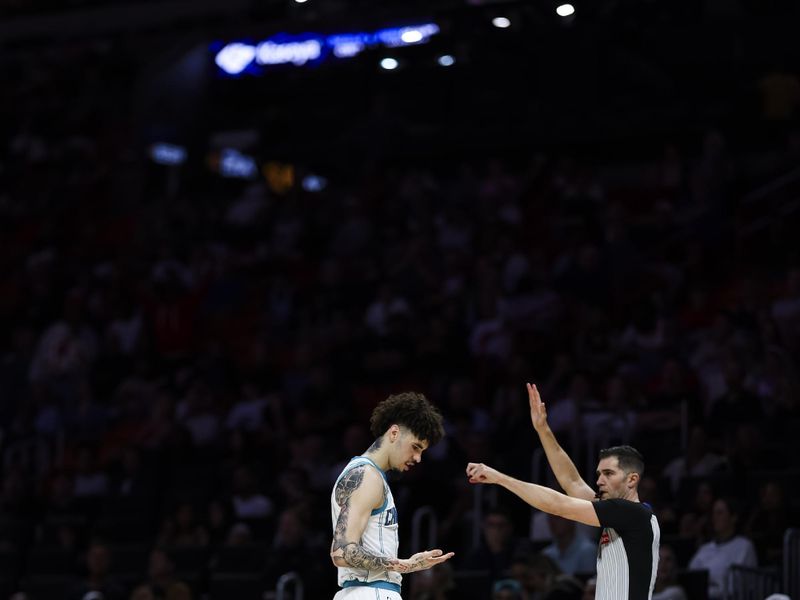 MIAMI, FLORIDA - MARCH 10: LaMelo Ball #1 of the Charlotte Hornets reacts during the fourth quarter against the Miami Heat at Kaseya Center on March 10, 2025 in Miami, Florida. NOTE TO USER: User expressly acknowledges and agrees that, by downloading and or using this photograph, User is consenting to the terms and conditions of the Getty Images License Agreement. (Photo by Brennan Asplen/Getty Images)