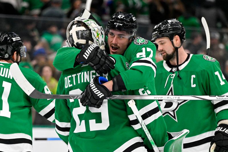 Jan 16, 2024; Dallas, Texas, USA; Dallas Stars goaltender Jake Oettinger (29) and left wing Mason Marchment (27) and left wing Jamie Benn (14) celebrate on the ice after the Stars victory over the Los Angeles Kings at the American Airlines Center. Mandatory Credit: Jerome Miron-USA TODAY Sports