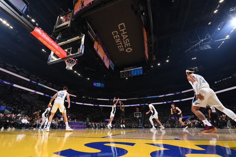 SAN FRANCISCO, CA - FEBRUARY 3: Andrew Wiggins #22 of the Golden State Warriors shoots a three point basket during the game against the Orlando Magic on February 3, 2025 at Chase Center in San Francisco, California. NOTE TO USER: User expressly acknowledges and agrees that, by downloading and or using this photograph, user is consenting to the terms and conditions of Getty Images License Agreement. Mandatory Copyright Notice: Copyright 2025 NBAE (Photo by Noah Graham/NBAE via Getty Images)