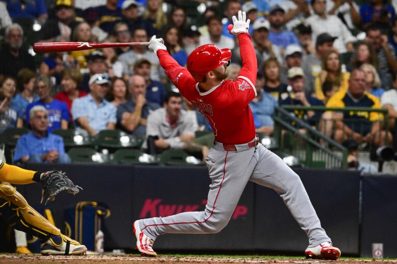 Sep 17, 2025; Milwaukee, Wisconsin, USA; Los Angeles Angels left fielder Taylor Ward (3) hits a solo home run in the sixth inning against the Milwaukee Brewers at American Family Field. Mandatory Credit: Benny Sieu-Imagn Images