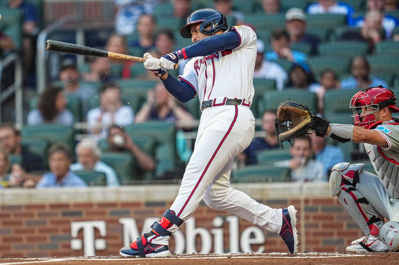 Aug 20, 2024; Cumberland, Georgia, USA; Atlanta Braves right fielder Ramon Laureano (18) gets a broken bat base hit against the Philadelphia Phillies during the first inning at Truist Park. Mandatory Credit: Dale Zanine-USA TODAY Sports