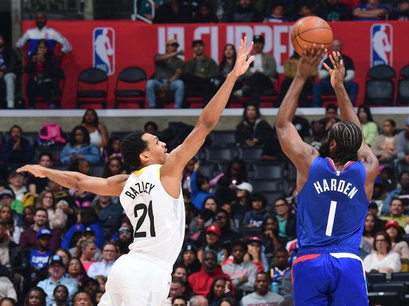 LOS ANGELES, CA - APRIL 5:  Darius Bazley #21 of the Utah Jazz plays defense during the game  against James Harden #1 of the LA Clippers on April 5, 2024 at Crypto.Com Arena in Los Angeles, California. NOTE TO USER: User expressly acknowledges and agrees that, by downloading and/or using this Photograph, user is consenting to the terms and conditions of the Getty Images License Agreement. Mandatory Copyright Notice: Copyright 2024 NBAE (Photo by Adam Pantozzi/NBAE via Getty Images)