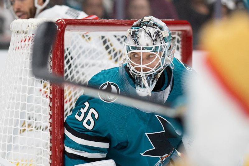 Sep 24, 2023; San Jose, California, USA;  San Jose Sharks goalie Kaapo Kahkonen (36) watches the puck during the third period against the Vegas Golden Knights at SAP Center at San Jose. Mandatory Credit: Stan Szeto-USA TODAY Sports