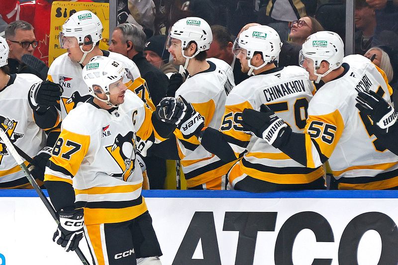 Jan 22, 2026; Edmonton, Alberta, CAN; The Pittsburgh Penguins celebrate a goal scored by forward Sidney Crosby (87) during the first period against the Edmonton Oilers at Rogers Place. Mandatory Credit: Perry Nelson-Imagn Images