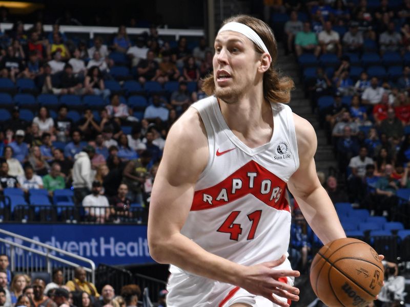 ORLANDO, FL - MARCH 17: Kelly Olynyk #41 of the Toronto Raptor drives to the basket during the game against the Orlando Magic on March 17, 2024 at the Kia Center in Orlando, Florida. NOTE TO USER: User expressly acknowledges and agrees that, by downloading and or using this photograph, User is consenting to the terms and conditions of the Getty Images License Agreement. Mandatory Copyright Notice: Copyright 2024 NBAE (Photo by Fernando Medina/NBAE via Getty Images)