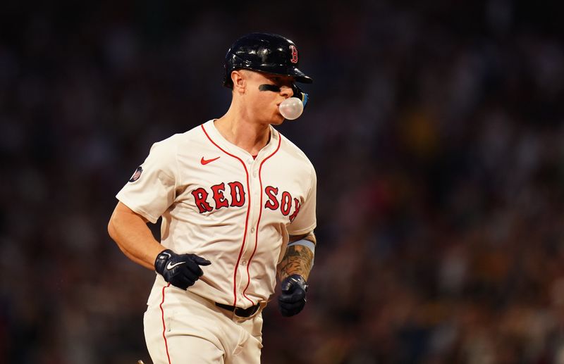 Jun 13, 2024; Boston, Massachusetts, USA; Boston Red Sox right fielder Tyler O'Neill (17) hits a three run home run against the Philadelphia Phillies in the fourth inning at Fenway Park. Mandatory Credit: David Butler II-USA TODAY Sports