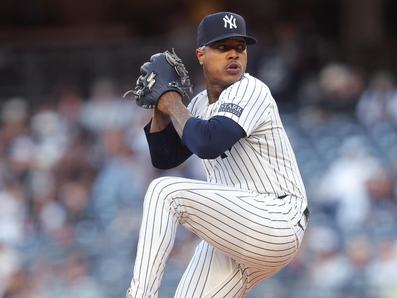 May 20, 2024; Bronx, New York, USA; New York Yankees starting pitcher Marcus Stroman (0) pitches against the Seattle Mariners during the first inning at Yankee Stadium. Mandatory Credit: Brad Penner-USA TODAY Sports