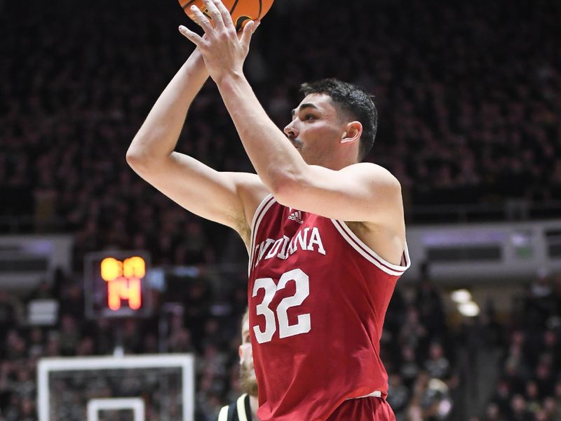 Jan 31, 2025; West Lafayette, Indiana, USA; Indiana Hoosiers guard Trey Galloway (32) scores past Purdue Boilermakers guard Braden Smith (3) during the first half at Mackey Arena. Mandatory Credit: Robert Goddin-Imagn Images