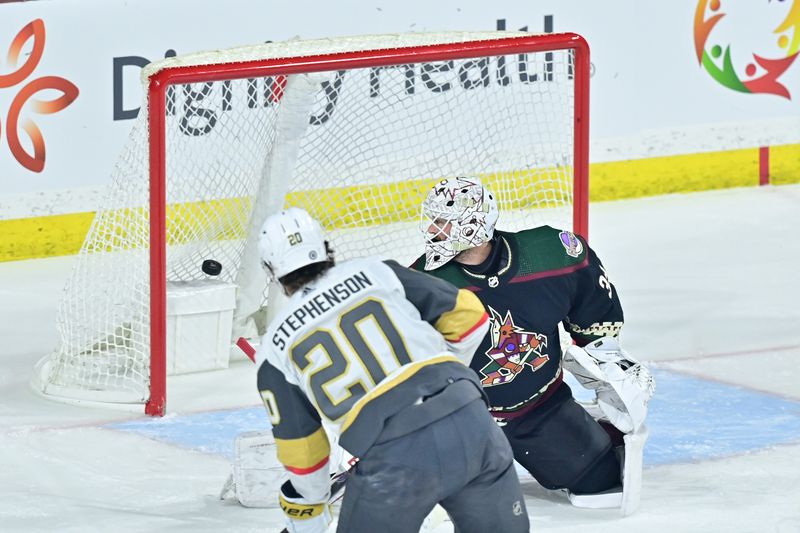 Feb 8, 2024; Tempe, Arizona, USA; Vegas Golden Knights center Chandler Stephenson (20) scores on Arizona Coyotes goaltender Connor Ingram (39) in the first period at Mullett Arena. Mandatory Credit: Matt Kartozian-USA TODAY Sports