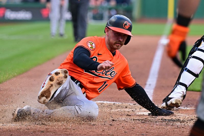 Apr 6, 2024; Pittsburgh, Pennsylvania, USA; Baltimore Orioles second base Jordan Westburg (11) scores a run during the seventh inning against the Pittsburgh Pirates at PNC Park. Mandatory Credit: David Dermer-USA TODAY Sports