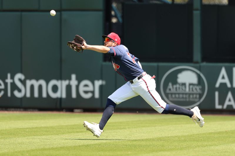 Mar 25, 2024; North Port, Florida, USA; Atlanta Braves left fielder Forrest Wall (73) catches a fly ball during the first inning against the Minnesota Twins at CoolToday Park. Mandatory Credit: Kim Klement Neitzel-USA TODAY Sports