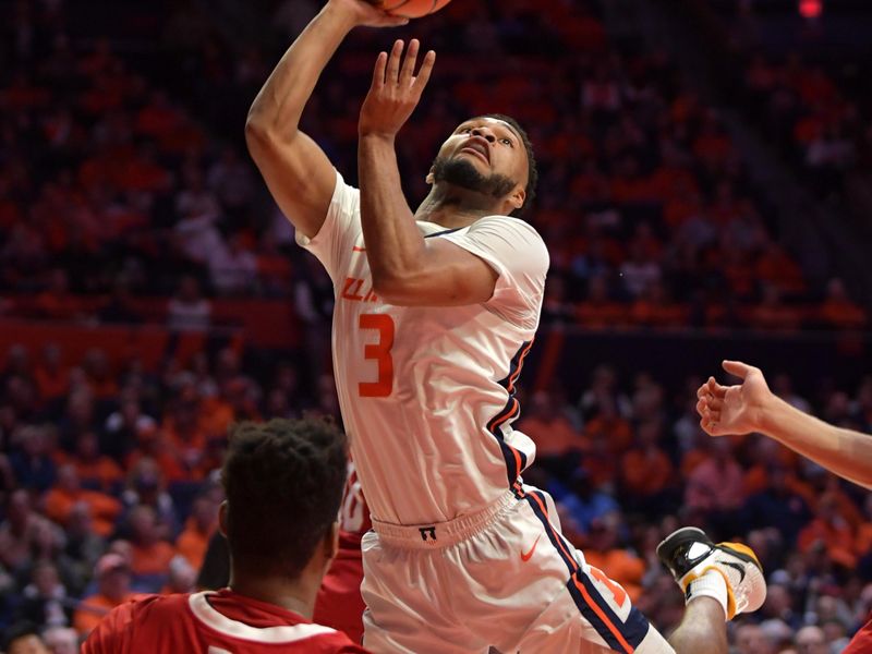 Jan 31, 2023; Champaign, Illinois, USA; Illinois Fighting Illini guard Jayden Epps (3) drives to the basket as Nebraska Cornhuskers forward Blaise Keita (15) tries to defend during the first half at State Farm Center. Mandatory Credit: Ron Johnson-USA TODAY Sports