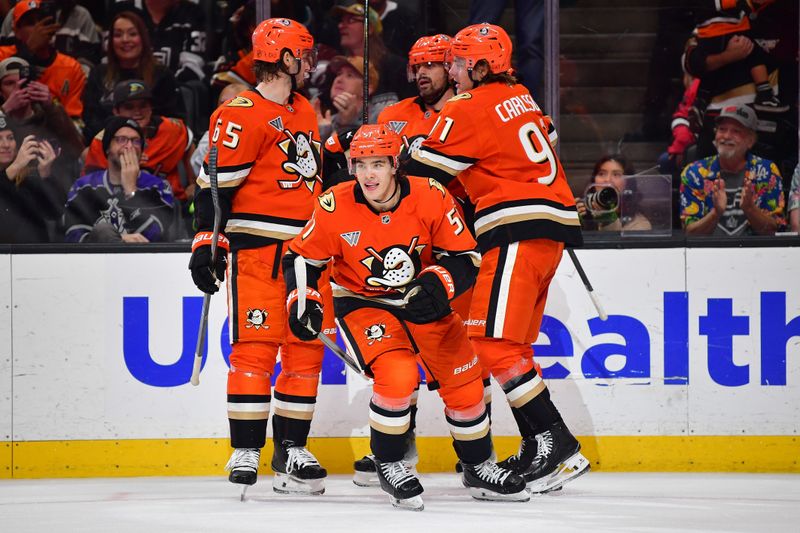Nov 28, 2025; Anaheim, California, USA; Anaheim Ducks defenseman Olen Zellweger (51) celebrates his goal scored against the Los Angeles Kings during the second period at Honda Center. Mandatory Credit: Gary A. Vasquez-Imagn Images