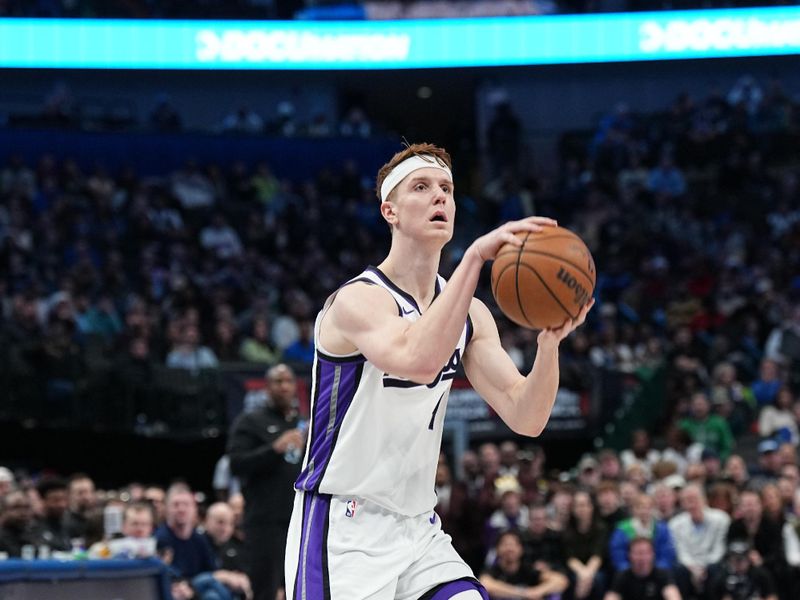 DALLAS, TX - JANUARY 27: Kevin Huerter #9 of the Sacramento Kings shoots a three point basket during the game   on January 27, 2024 at the American Airlines Center in Dallas, Texas. NOTE TO USER: User expressly acknowledges and agrees that, by downloading and or using this photograph, User is consenting to the terms and conditions of the Getty Images License Agreement. Mandatory Copyright Notice: Copyright 2024 NBAE (Photo by Glenn James/NBAE via Getty Images)